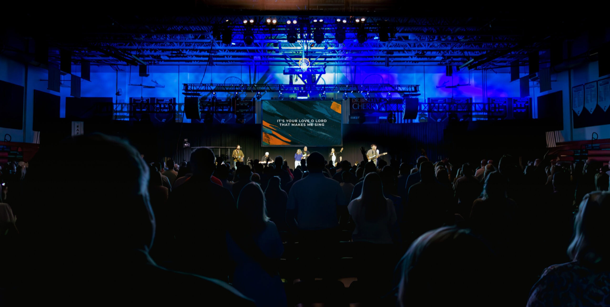 Before: Empty gymnasium before Portable Church setup.
